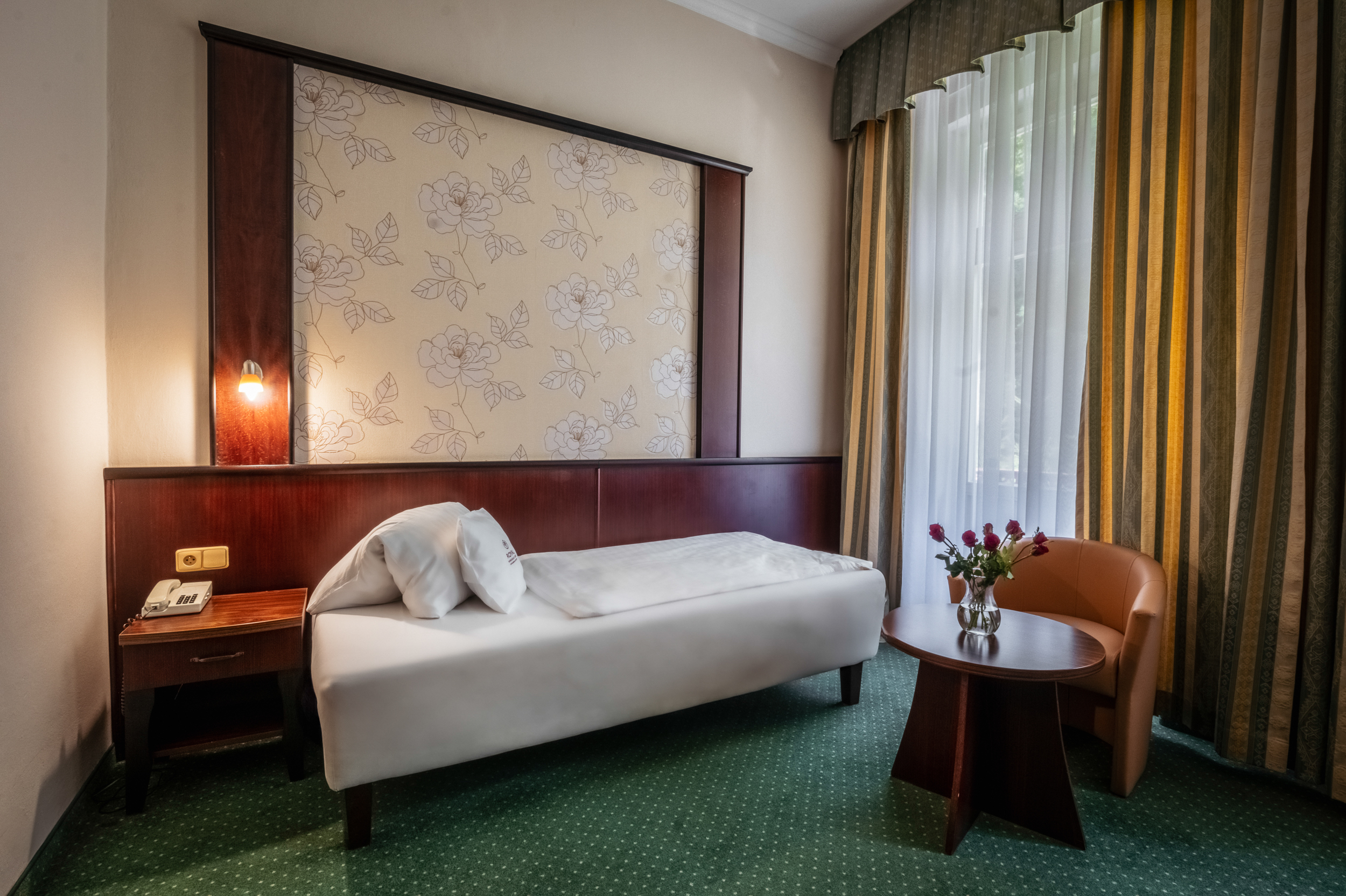 * View of the forrest park
* Hall with storage space
* Bedroom - single bed (extra bed for 1 person possible)
* TV + SAT, radio, telephone, fridge, safe
* Bathroom – shower + toilet, hairdryer
